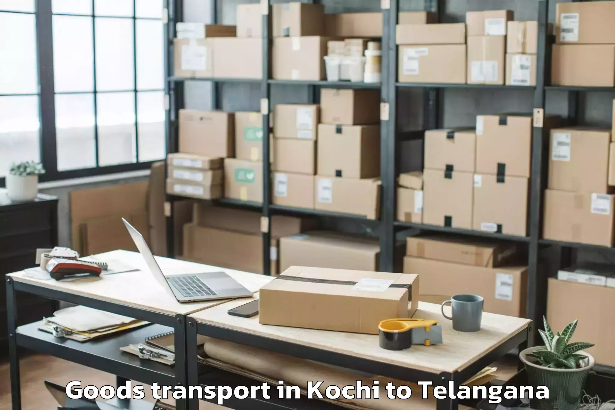 Discover Kochi to Narketpalle Goods Transport